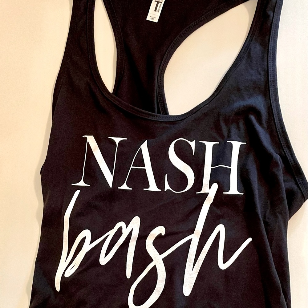 4 black with white writing “Nash Bash” shirts